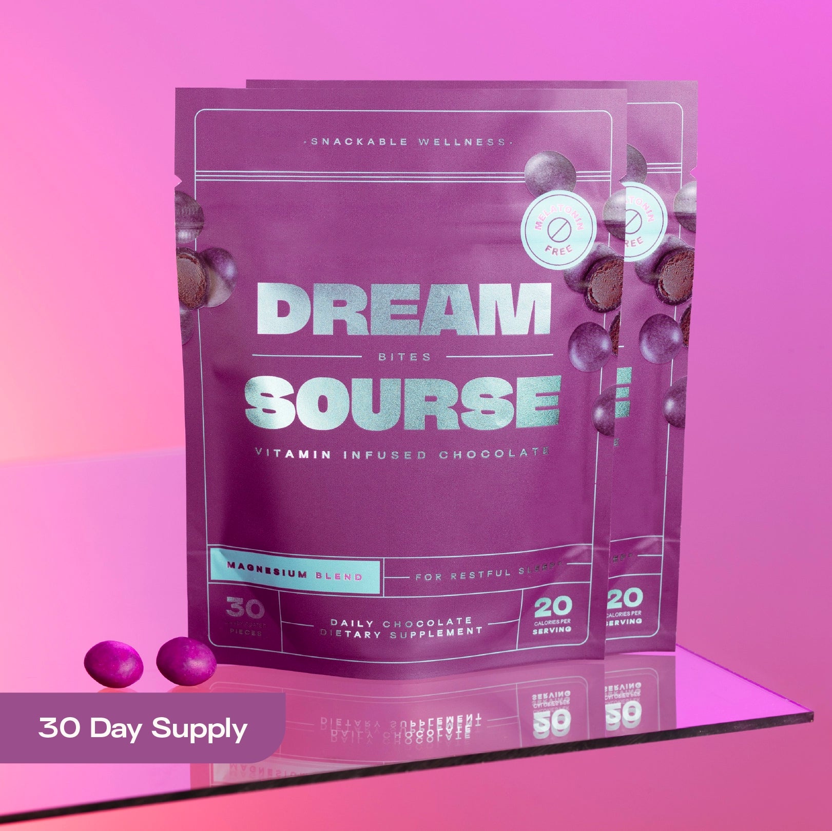 Two bags of Sourse Hair Grow vitamin-infused chocolate bites with purple candies.